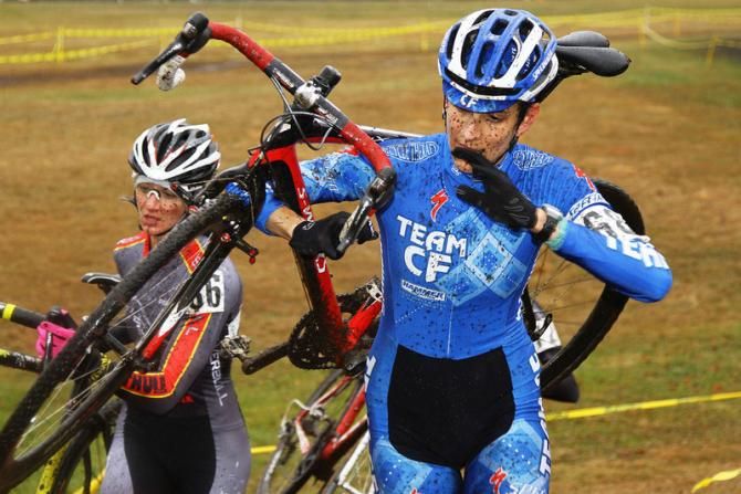 Team CF's Nicole Thiemann braces the bike and takes a breath on the barriers.