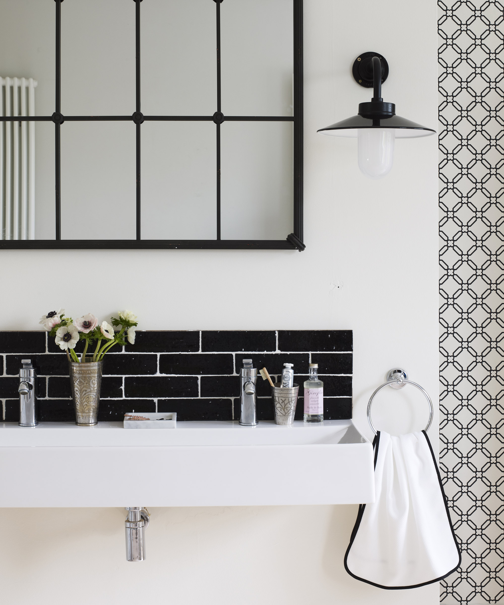 Wall-mounted modular furniture in a small bathroom