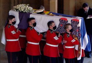 A Bearer Party of Grenadier Guards carry Prince Philip, Duke of Edinburgh's coffin