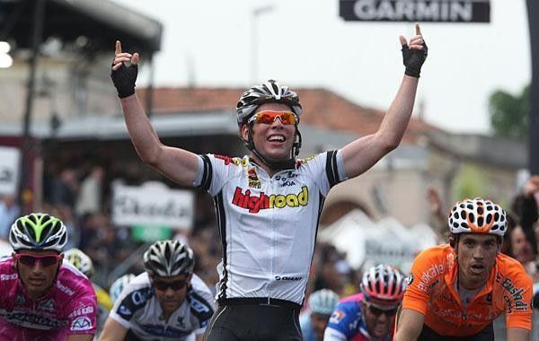 Mark Cavendish salutes with one finger for each win.