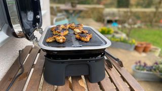 Weber Lumin Compact being used at home