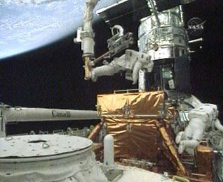 Astronauts Repair Key Hubble Device in Tough Spacewalk