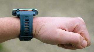 Garmin Instinct 3 on our reviewer's wrist, a view from the side