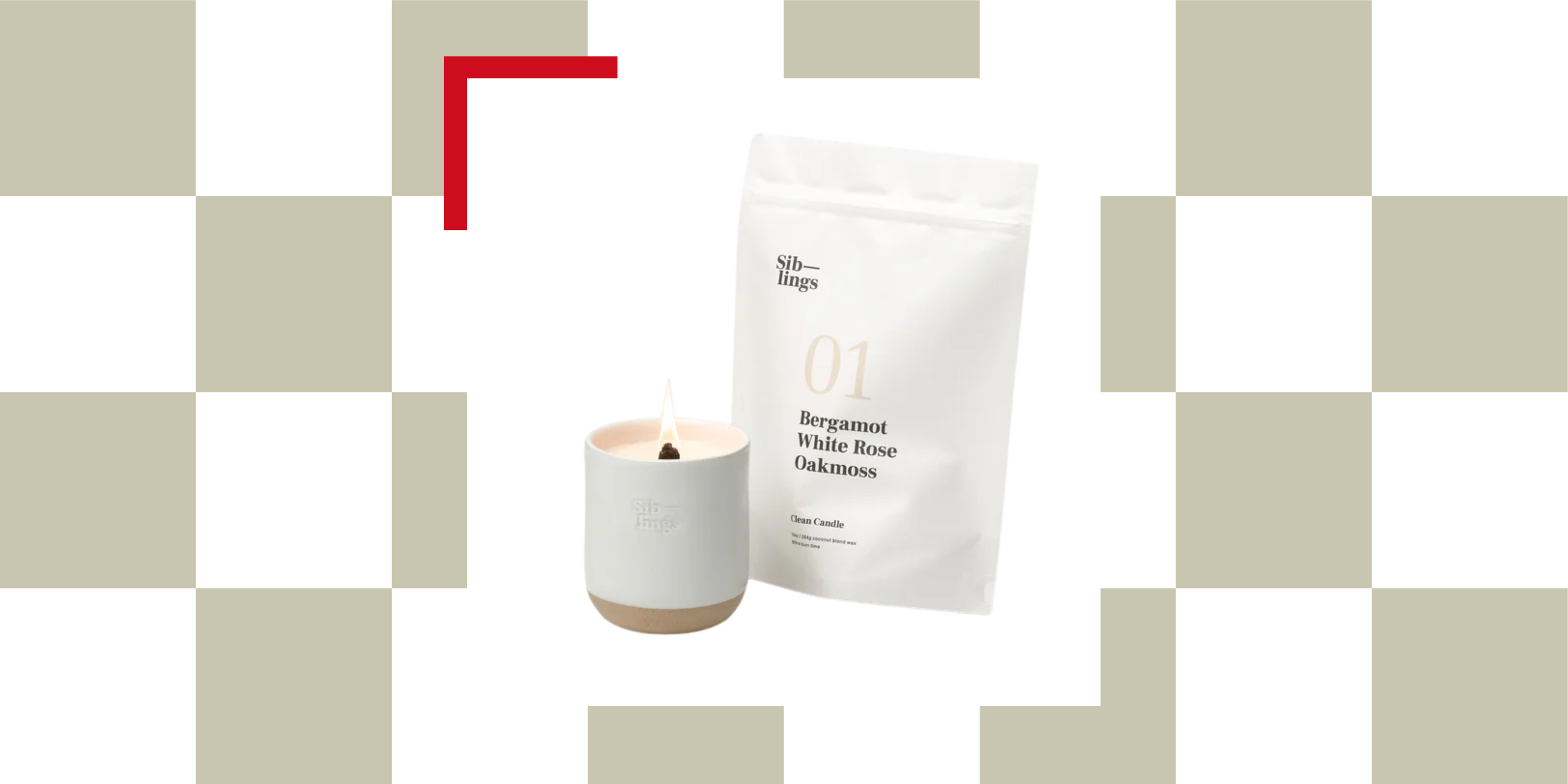 a candle next to a bag of candle refill