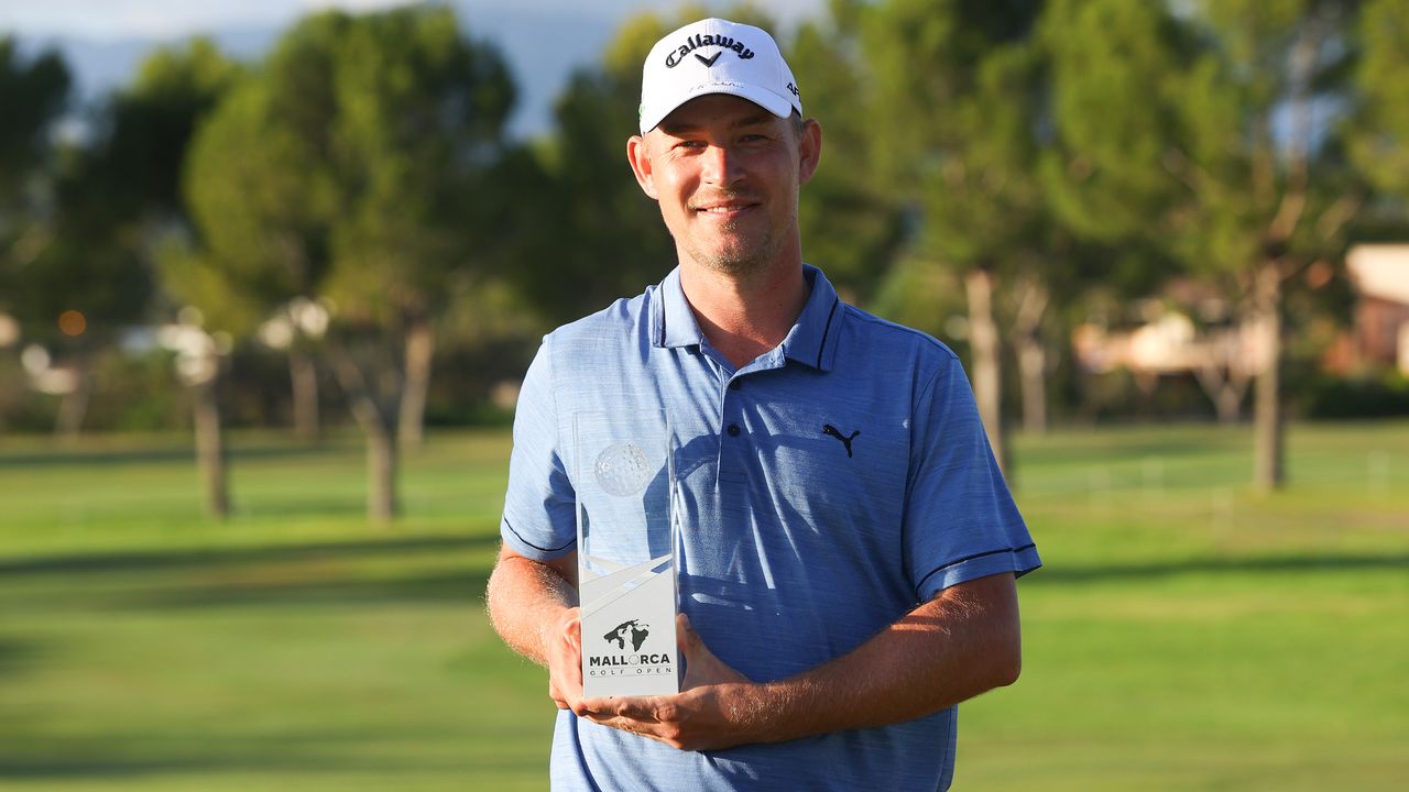 Jeff Winther poses with the trophy after winning the 2021 Mallorca Open