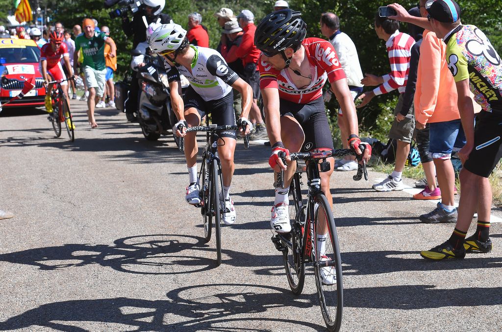 Thomas De Gendt (Lotto Soudal) and Serge Pauwels (Dimension Data) look back to check on Dani Navarro (Cofidis)
