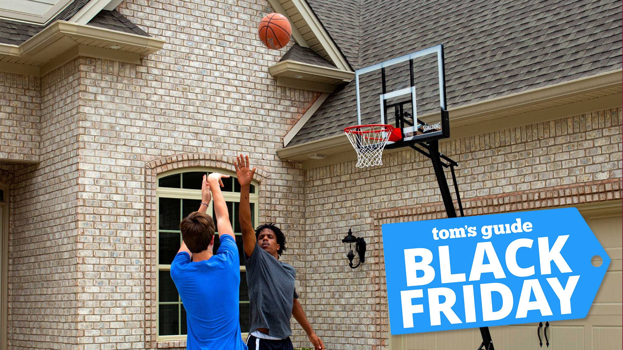Spalding 54-inch Basketball Hoop in a driveway