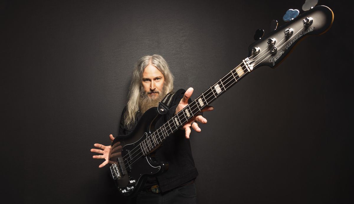 Mastodon&#039;s Troy Sanders holds his new signature Fender Precision Bass