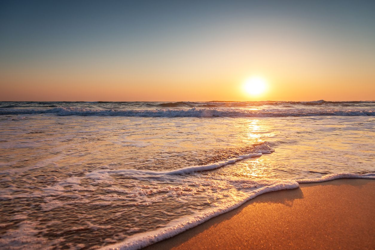 The beach at sunrise.