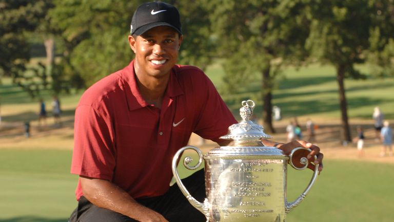 Tiger Woods poses with the Wanamaker Trophy after his 2007 PGA Championship victory