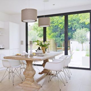 dining room with table chairs and sliding doors