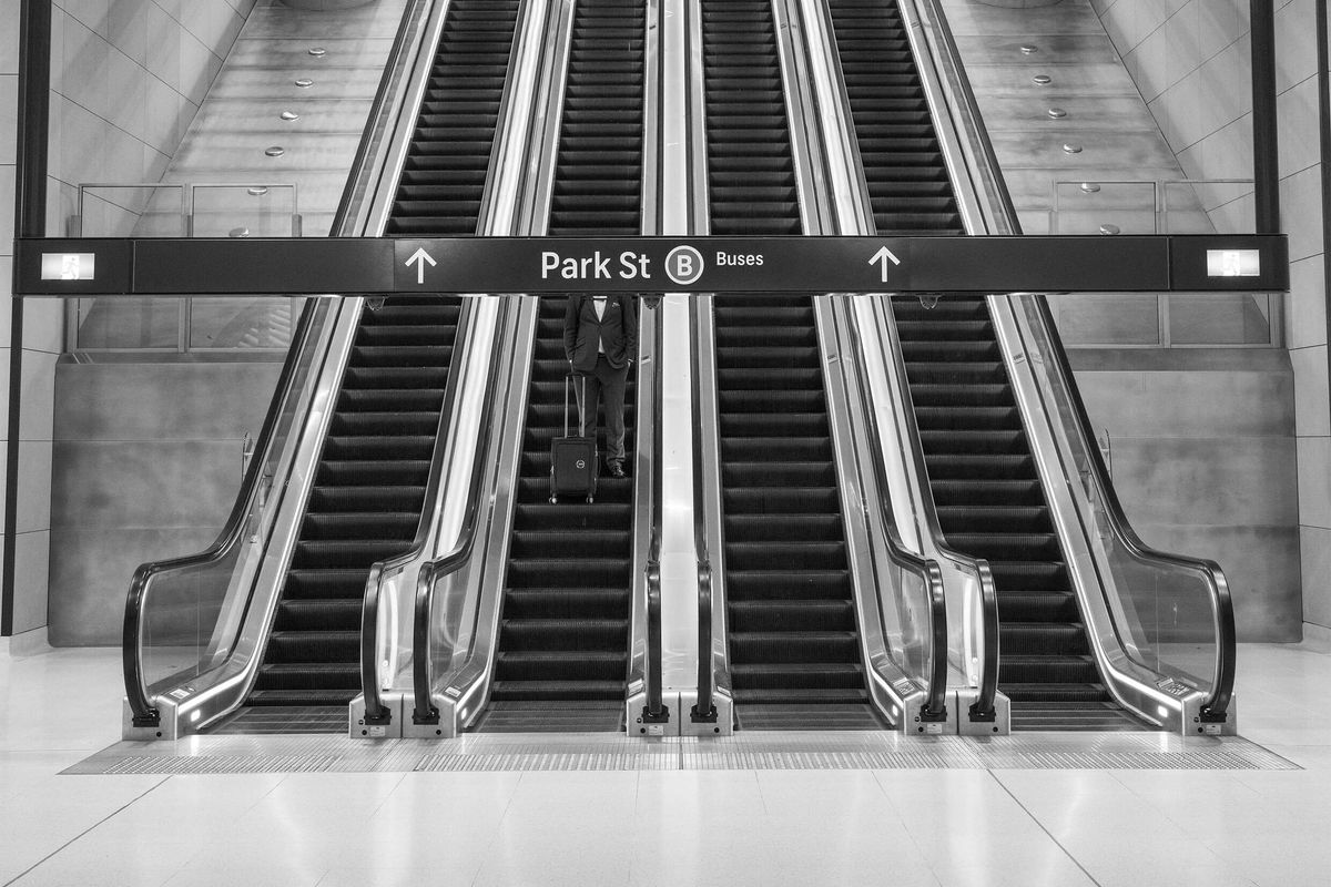 Person on escalator.