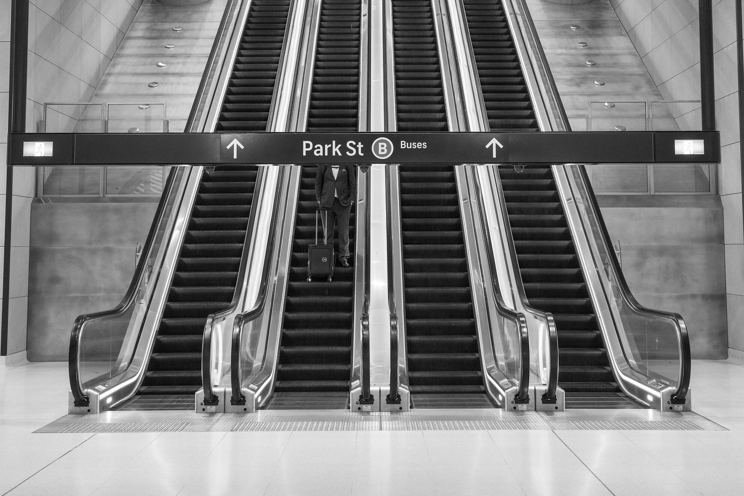 Person on escalator.