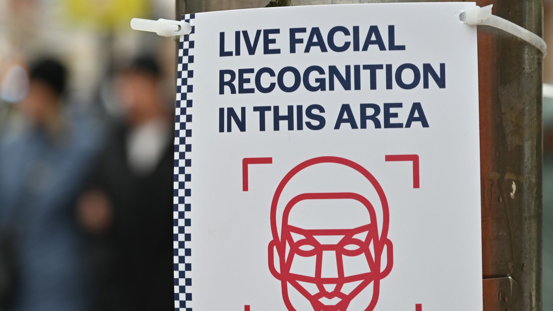 A placard warns of live facial recognition in progress on the High Street on December 7, 2024 in Southend, England, United Kingdom.