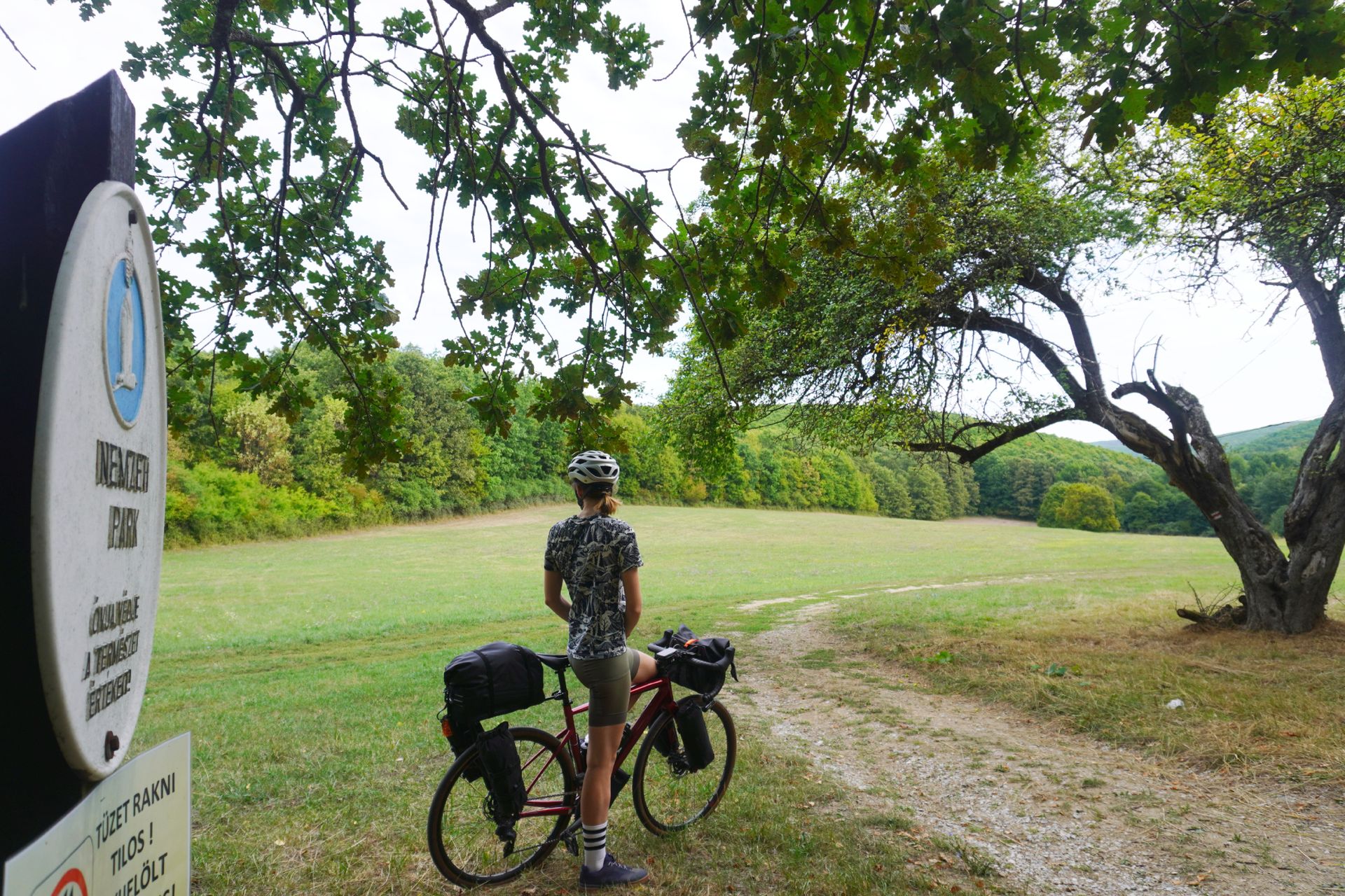 Image shows Anna at the entrance of the Bükk national park