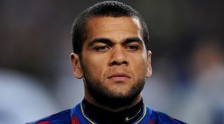 BARCELONA, SPAIN - NOVEMBER 24: Daniel Alves of FC Barcelona looks on prior to the start of the UEFA Champions League group F match between FC Barcelona and Inter Milan at the Camp Nou Stadium on November 24, 2009 in Barcelona, Spain. Barcelona won the match 2-0. (Photo by Jasper Juinen/Getty Images)