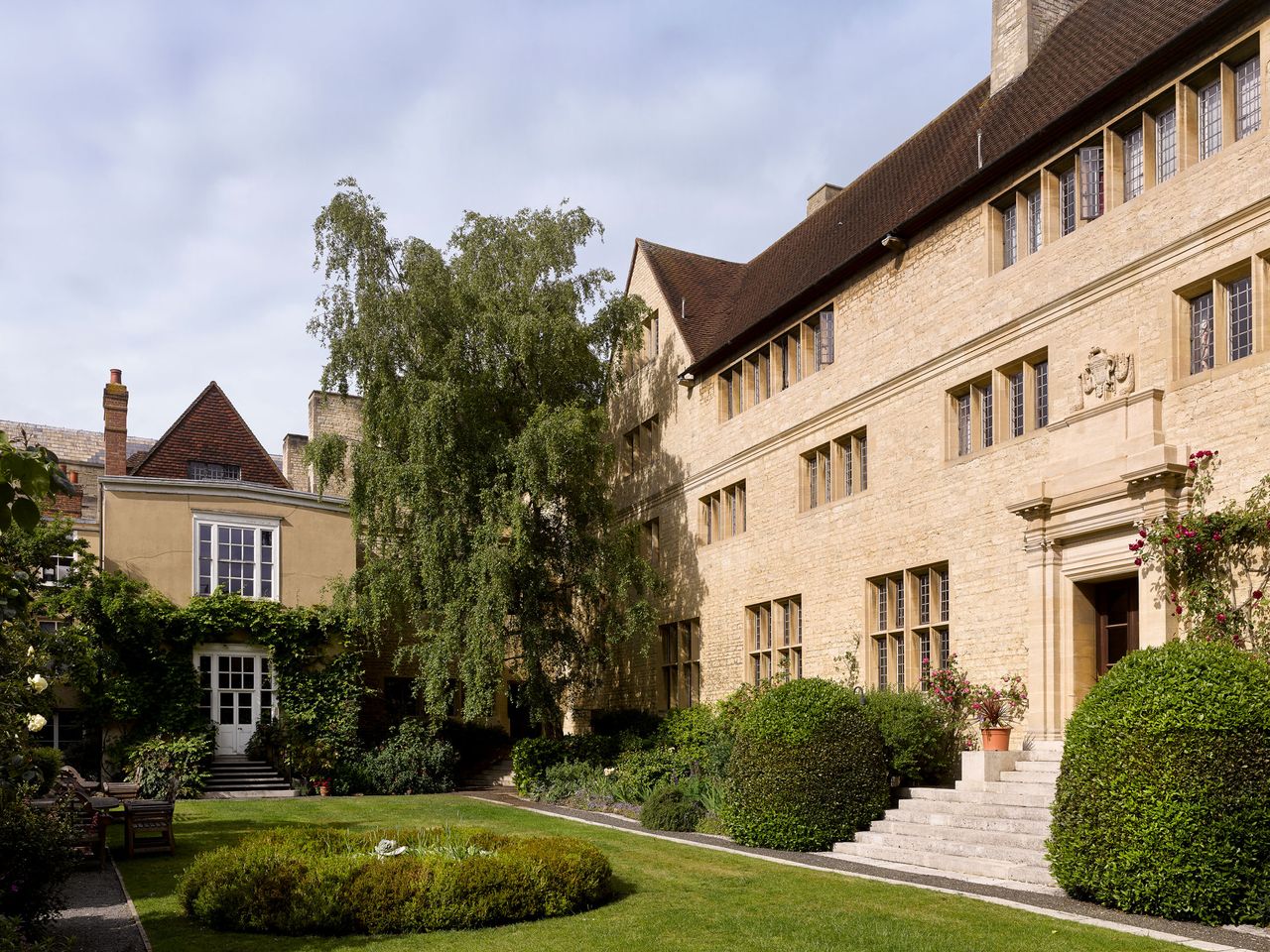 Fig 1: The recessed Brewer Street doorway keeps what lies inside a mystery. Campion Hall, University of Oxford. Photographed by Will Pryce for the Country Life Picture Library.