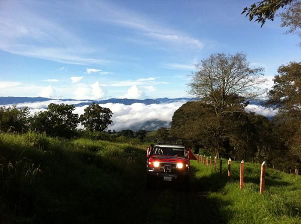 The media truck negotiates a road lined with Costa Rican cobbles