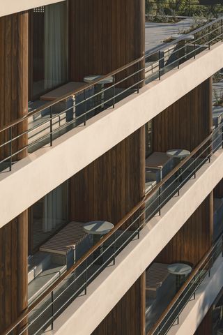 The modern extension complete with stylish balconies