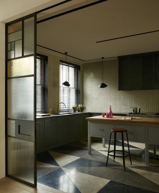 Green kitchen with island