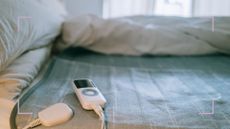 an electric blanket on a bed to support guidance on how much does it cost to run an electric blanket