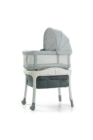 Best bassinets, image shows grey bassinet with bedding and hood