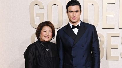 Charles Melton and his mother at the 2024 Golden Globes