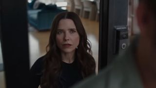 Sophia Bush opening door in The Stranger in My Home.