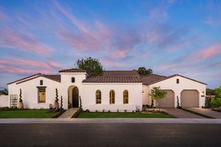 Painted suburban home with minimal front yard