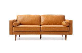 A small tan leather sofa with high legs