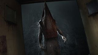 Silent Hill 2 remake screenshot - Pyramid Head standing in the rain