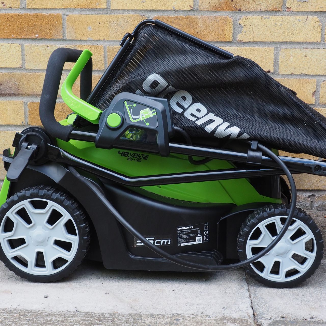 Greenworks G24X2LM36 Cordless Lawnmower during testing at home