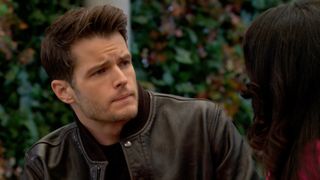 Michael Mealor as Kyle Abbott in a leather coat in The Young and the Restless