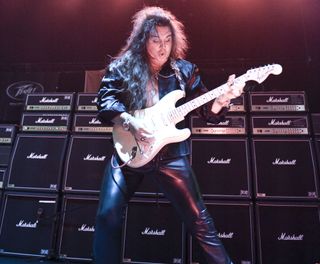 Yngwie Malmsteen performs live at the International Music Show in London on June 14, 2008
