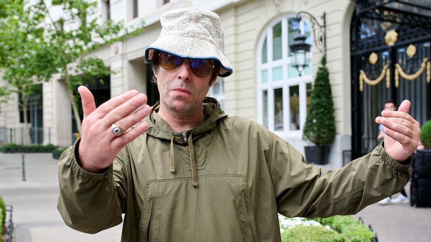 liam gallagher in a hat