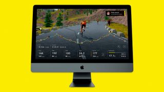 An image of an Apple iMac with Bkool on the screen