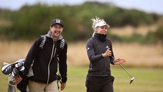 Annebell Fuller talks to her caddie at AIG Women's Open final qualifying