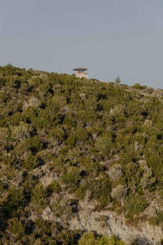 hut in cyprus in a national park by Anastasiou Misseri on a hill
