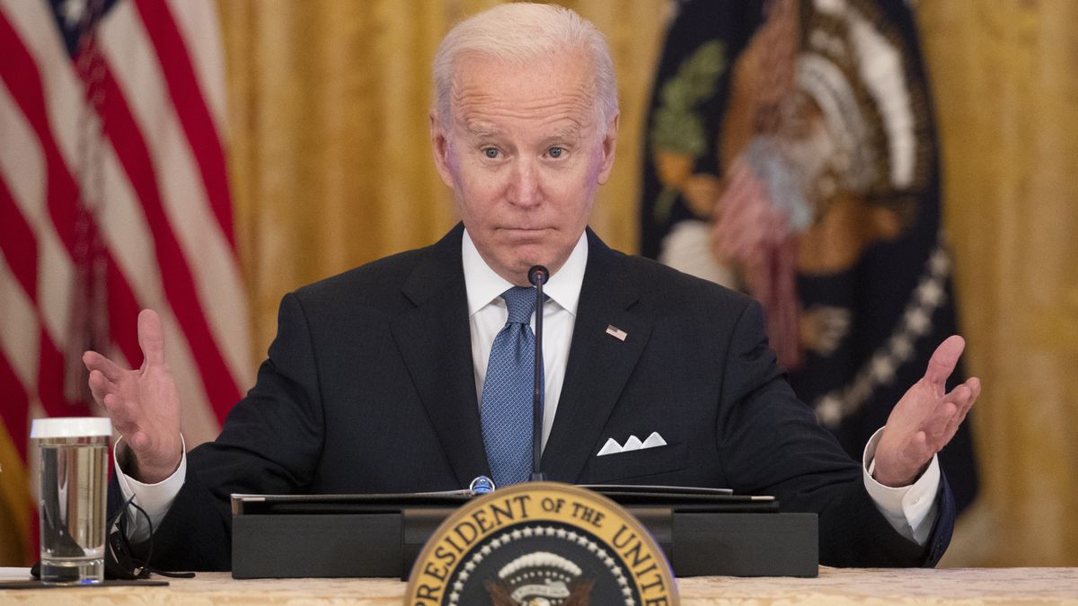 Joe Biden at a desk.