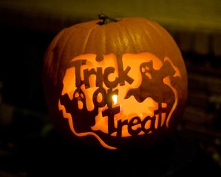 trick or treat carved halloween pumpkin
