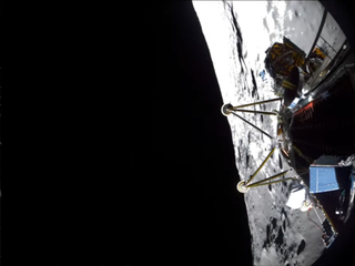 A view of the moon to the right, a grayish sliver of it. In the foreground there is a spacecraft.