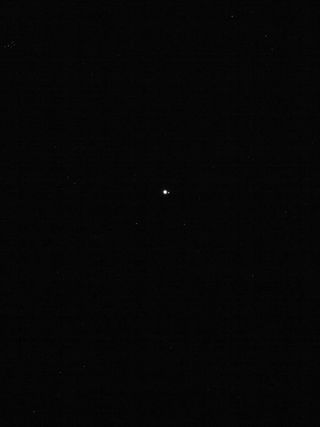Earth and the moon are mere dots in this photo captured on Jan. 17, 2018, from a distance of 39.5 million miles (63.6 million kilometers) by NASA's OSIRIS-REx asteroid-sampling spacecraft.