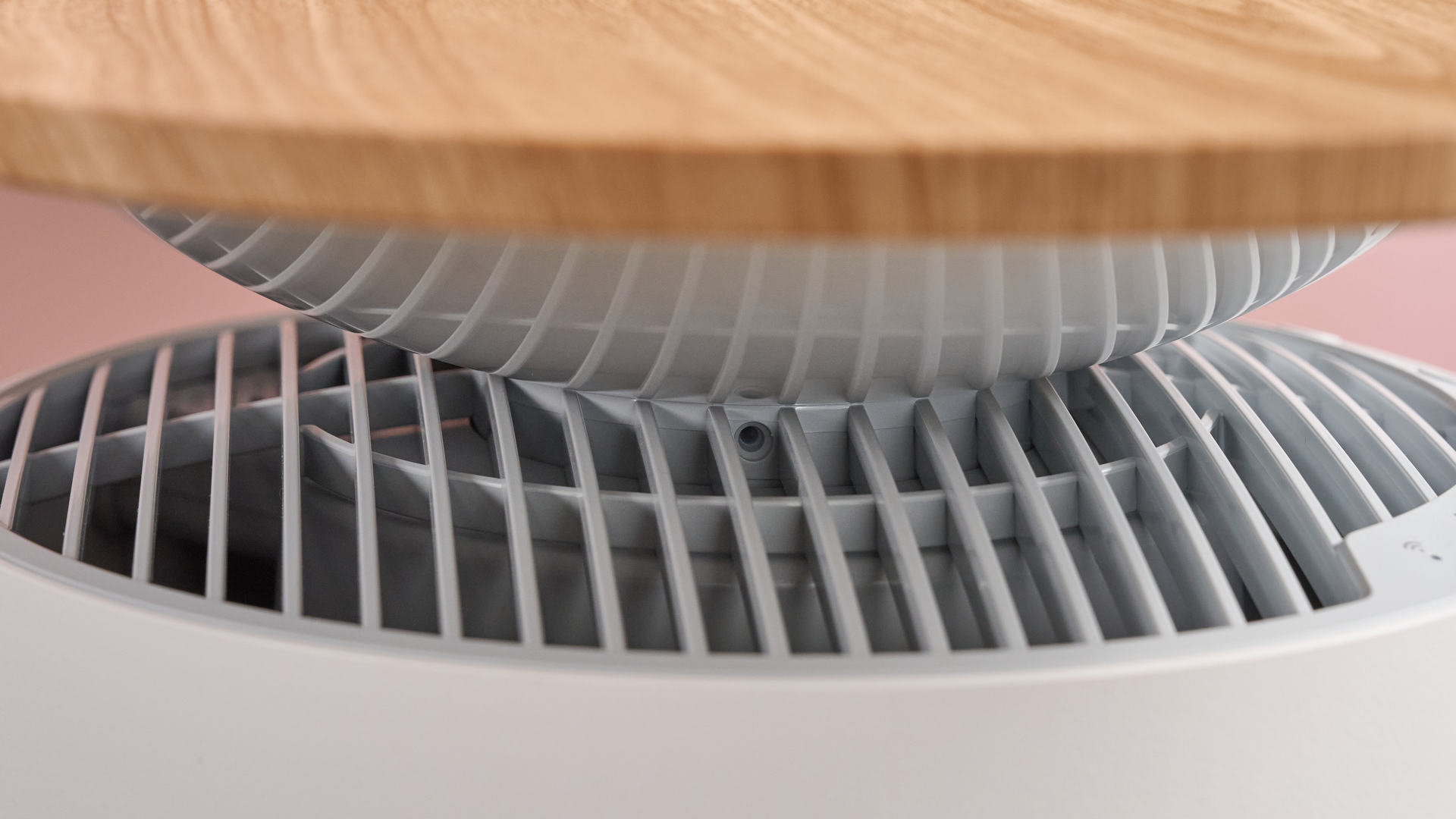 A close-up of the screw holes below the tabletop.