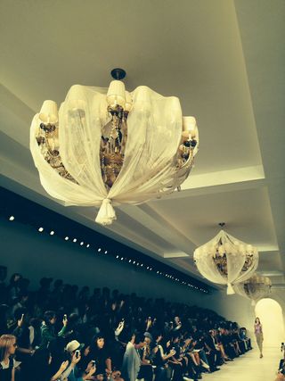 Chandeliers covered in transparent gauze