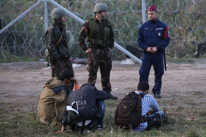 Hungary detains migrants who crossed into the country in violation of new laws