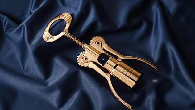 campagnolo the big corkscrew in gold against a blue cloth 