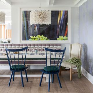 dining area with wooden flooring and metal chair