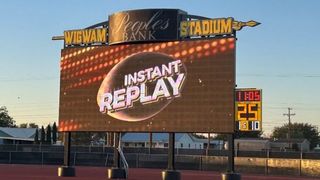 Two Watchfire videoboards light up Seminole High School's football field and basketball court. 