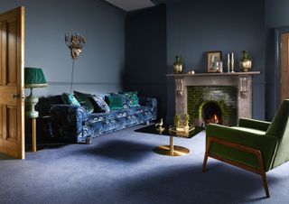 living room with dark blue carpet flooring