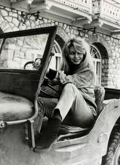 Motor vehicle, Photograph, Fender, Vehicle door, Sitting, Classic, Classic car, Monochrome, Auto part, Windshield,